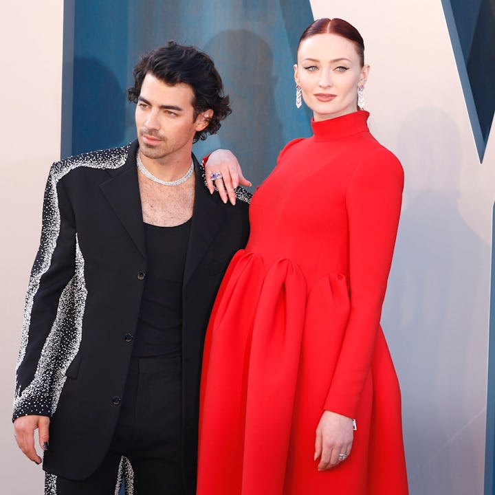 Joe Jonas and Sophie Turner walking the blue carpet at the Vanity Fair afterparty, where Turner show...