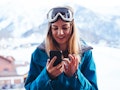 A woman on spring break at a ski resort uses clever captions for spring break for her Instagram post...
