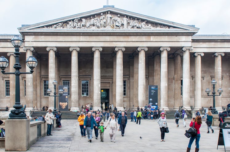 People walking next to the British Museum in the Bloomsbury area of central London, England, UK.