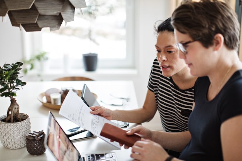 women working on their taxes