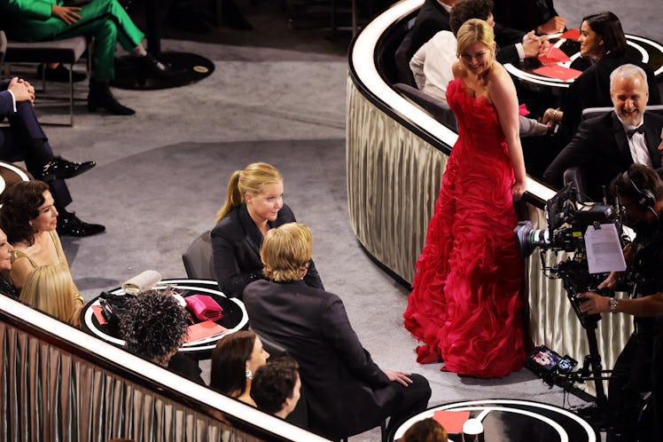 Co-host Amy Schumer, Jesse Plemons, and Kirsten Dunst are seen during the 94th Annual Academy Awards