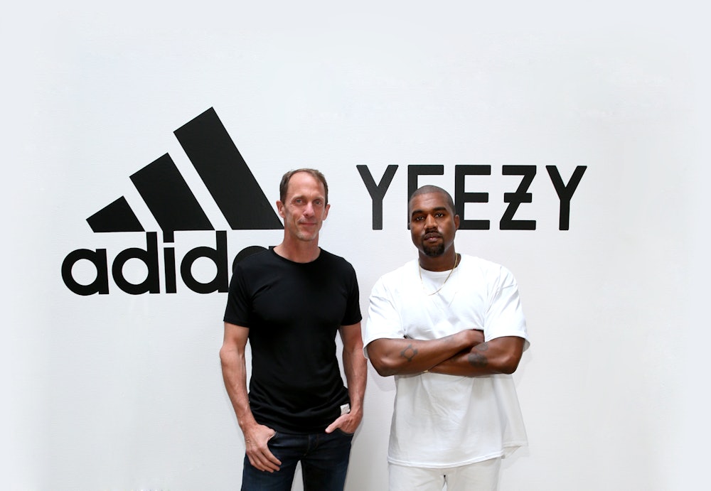HOLLYWOOD, CA - JUNE 28:  (L-R) adidas CMO Eric Liedtke and Kanye West at Milk Studios on June 28, 2...