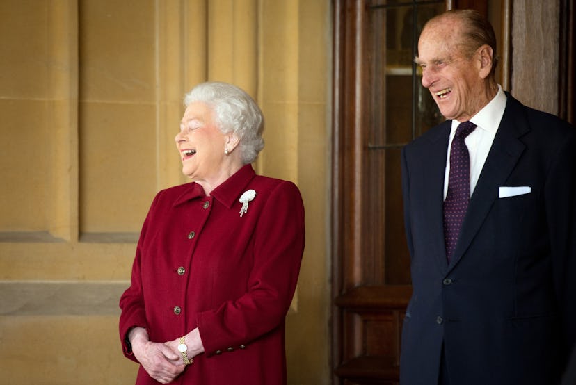 Britain's Queen Elizabeth II and Prince Philip, Duke of Edinburgh laughing