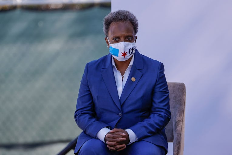 Chicago mayor Lori Lightfoot sits after speaking during the groundbreaking ceremony for the Obama Pr...