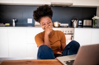 Young woman watching her favorite comedian show