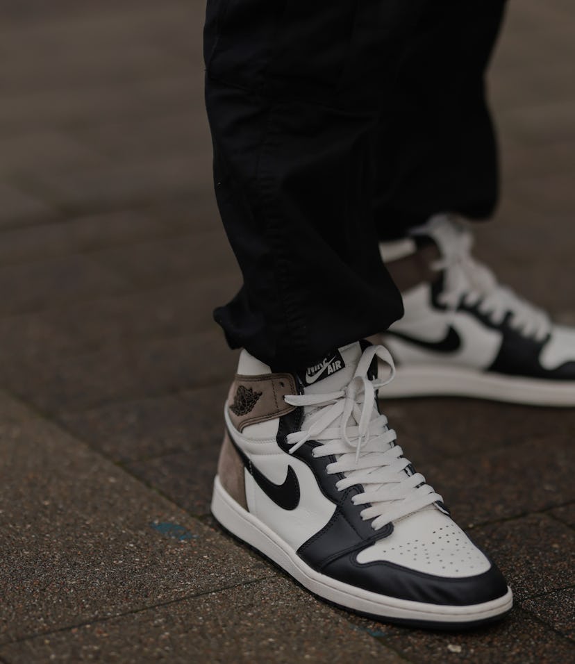 HAMBURG, GERMANY - JANUARY 14: Felix Hartmann wearing Air Jordan 1 Dark Mocha sneakers, and black Su...