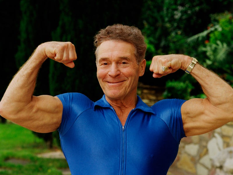 BEVERLY HILLS, CA - 1986: Former bodybuilder and fitness guru Jack LaLanne shows off his muscles du...