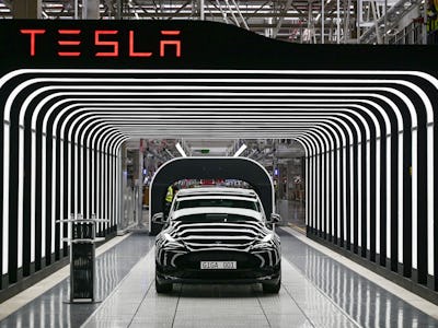 An electric vehicle of the model Y is pictured during the start of the production at Tesla's "Gigafa...