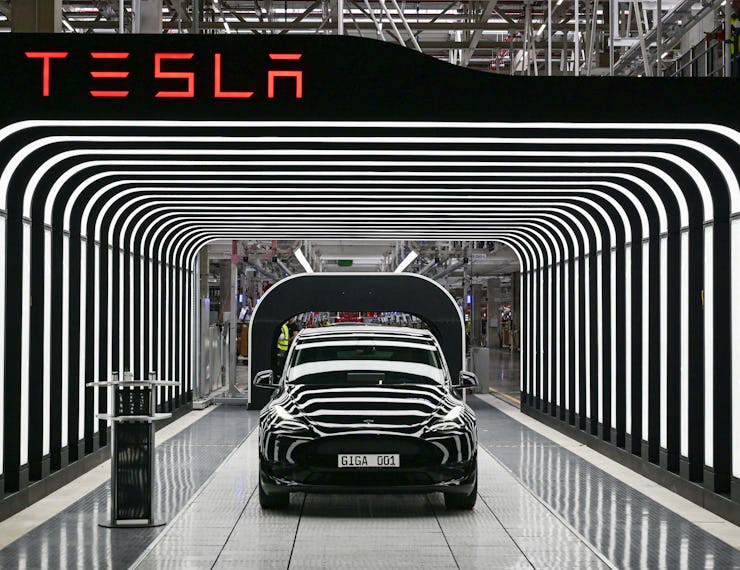 An electric vehicle of the model Y is pictured during the start of the production at Tesla's "Gigafa...