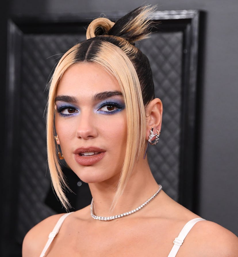 The most iconic Grammys hairstyles include Dua Lipa's contrasting topknot.