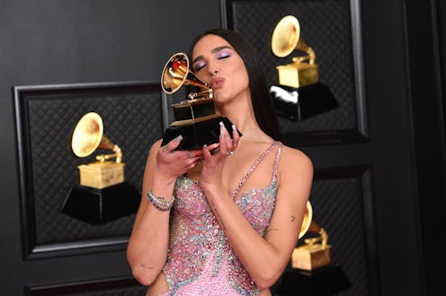 LOS ANGELES, CALIFORNIA - MARCH 14: Dua Lipa, winner of Best Pop Vocal Album for ‘Future Nostalgia’,...