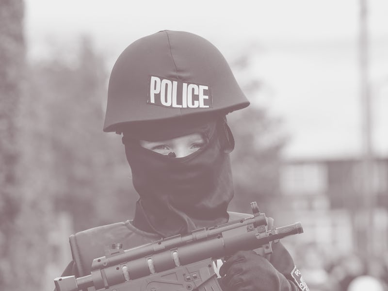 LONDON, UK, UNITED KINGDOM - 2020/03/10: An Orthodox Jewish child dressed as an armed police officer...