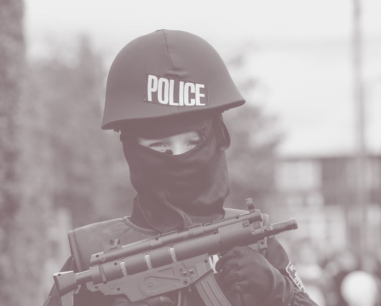 LONDON, UK, UNITED KINGDOM - 2020/03/10: An Orthodox Jewish child dressed as an armed police officer...