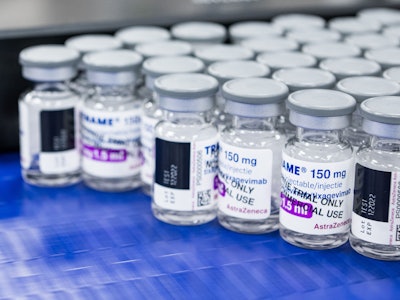 Vials of a test production are pictured at the assembly line of the manufacturing facility of pharma...