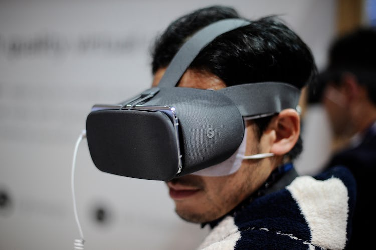 A congress attendant, testing the Google Daydream Vr device, during the Mobile World Congress Day 2 ...