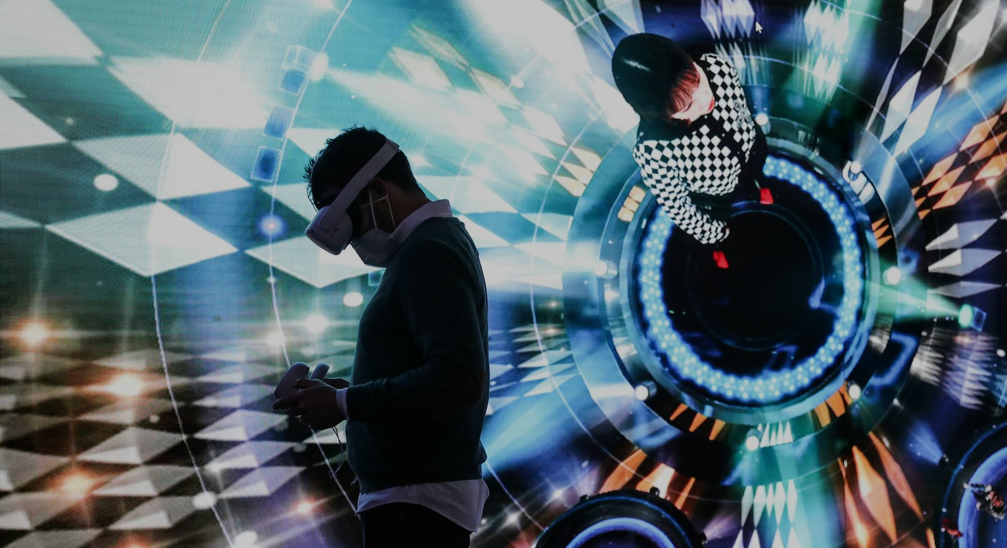 A man experiences the "Metaverse" via VR technology during the Mobile World Congress MWC in Barcelon...