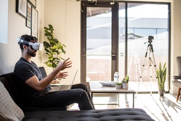 Gavin Menichini, using the Oculus Quest 2 VR headset, gives a demonstration of the Immersed Virtual ...
