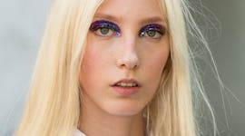 Sasha Komarova wore glittery, rainbow eyeshadow on July 03, 2019 in Paris, France.