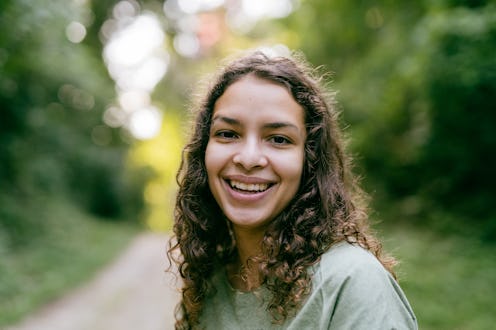 Smiling woman in the natural park