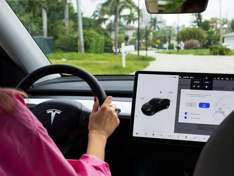 Miami, FL, United States - September 13, 2021: A cockpit with LCD touch screen of electric car Tesla...