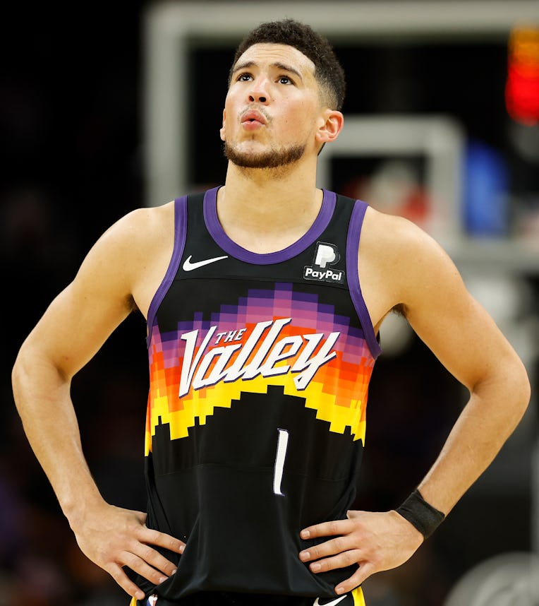 PHOENIX, ARIZONA - JANUARY 22: Devin Booker #1 of the Phoenix Suns during the second half of the NB...