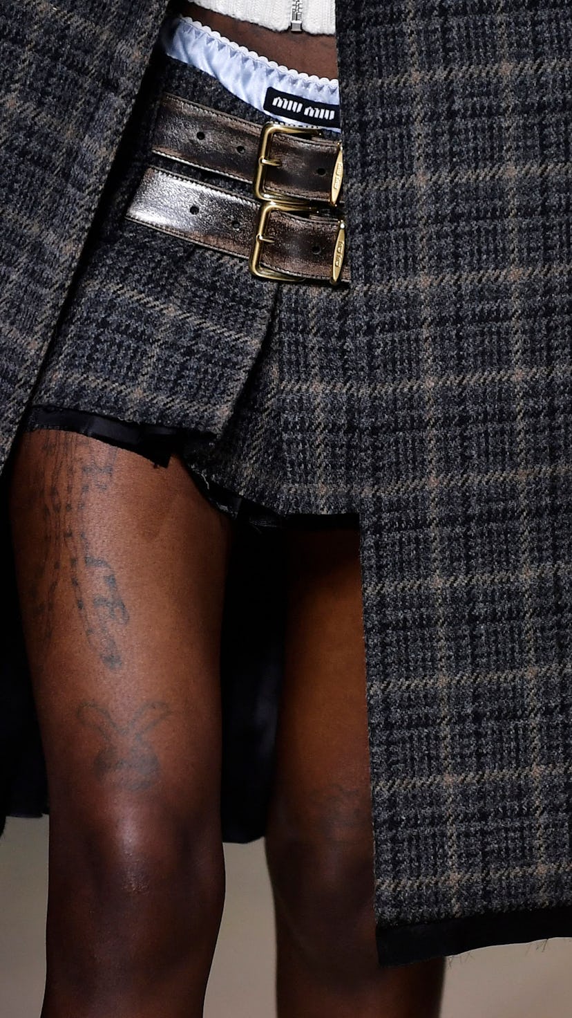A model presents a creation for the Miu Miu Fall-Winter 2022-2023 collection fashion show during the...