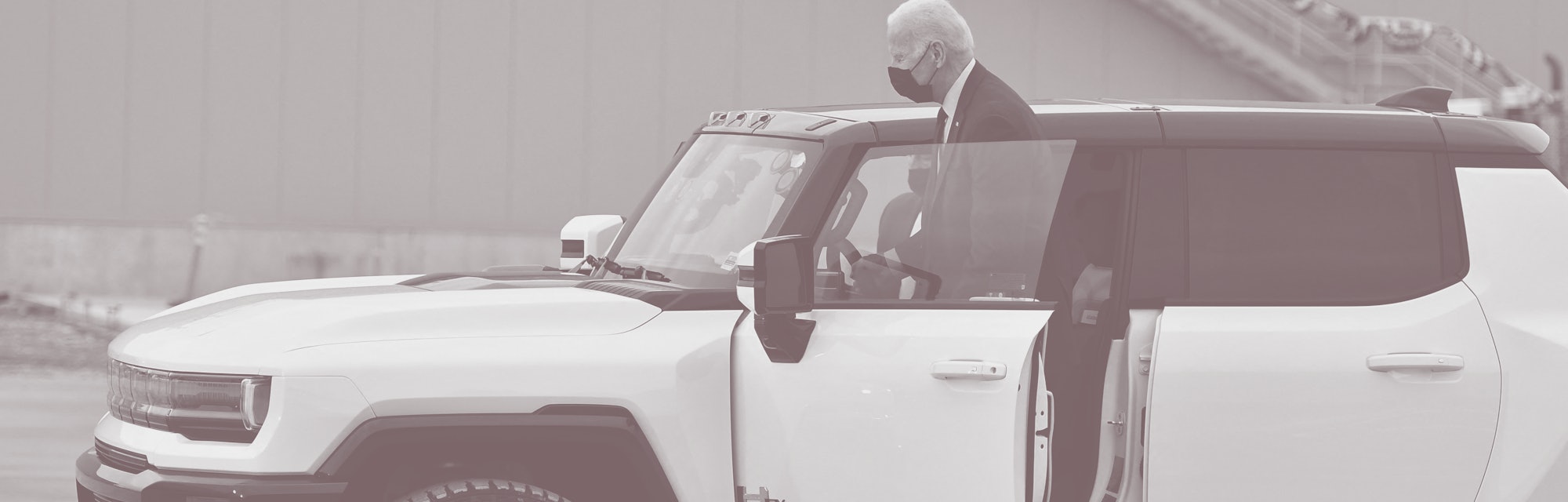 US President Joe Biden climbs into an electric hummer as he tours the General Motors Factory ZERO el...
