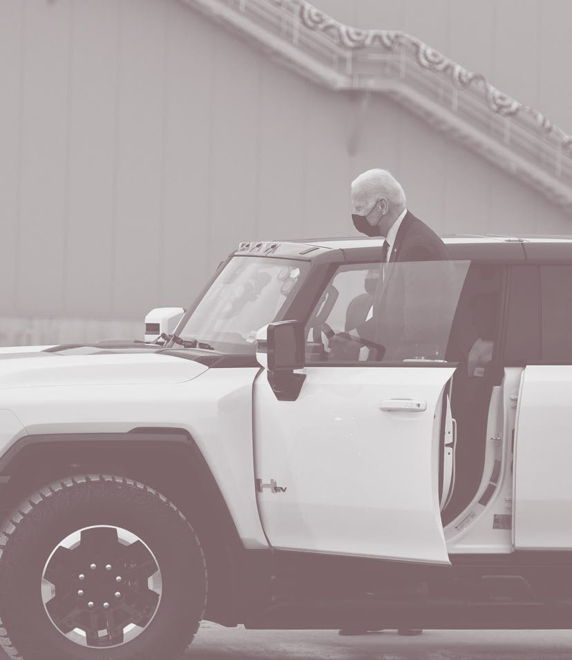 US President Joe Biden climbs into an electric hummer as he tours the General Motors Factory ZERO el...
