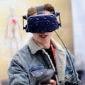 A congress attendant, test the new HTC Vive Pro, at HTC pavilion, during the Mobile World Congress d...