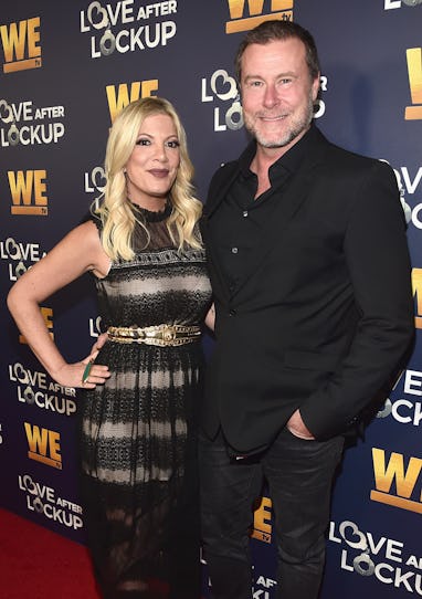 BEVERLY HILLS, CA - DECEMBER 11: Tori Spelling (L) and Dean McDermott attend WE tv celebrates the r...