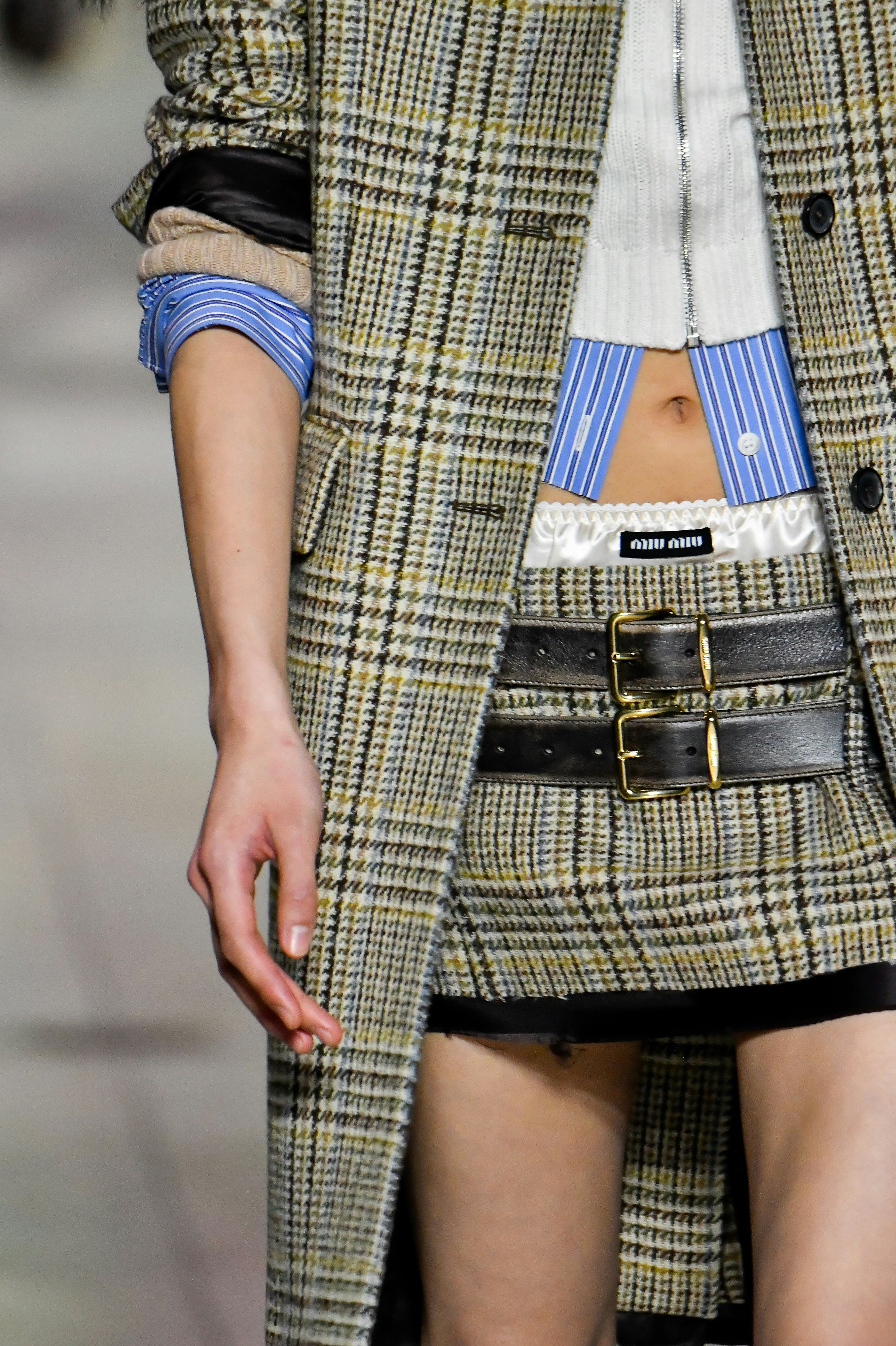 PARIS, FRANCE - MARCH 08: A model walks the runway during the Miu Miu Ready to Wear Fall/Winter 2022...