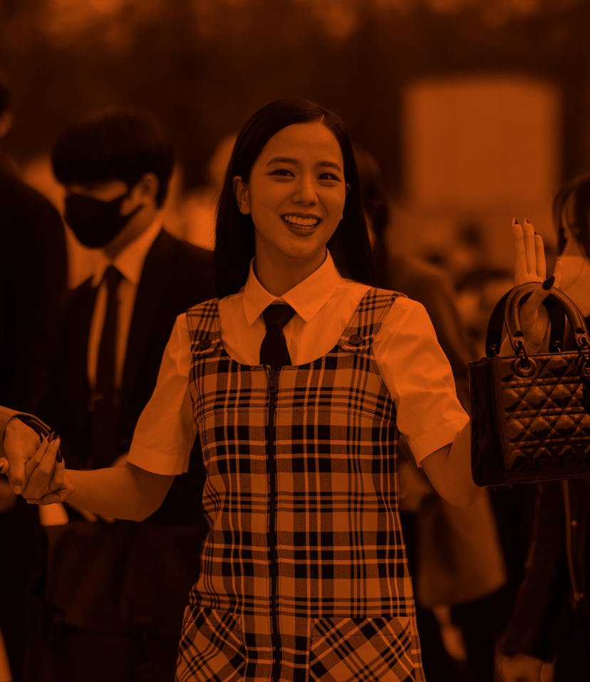 PARIS, FRANCE - MARCH 01: Kim Ji-soo aka Jisoo from Blackpink wears a white shirt from Dior, a black...