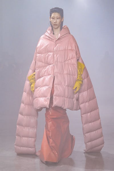 aa model wearing a pink quilted puffer coat on the Rick Owens runway