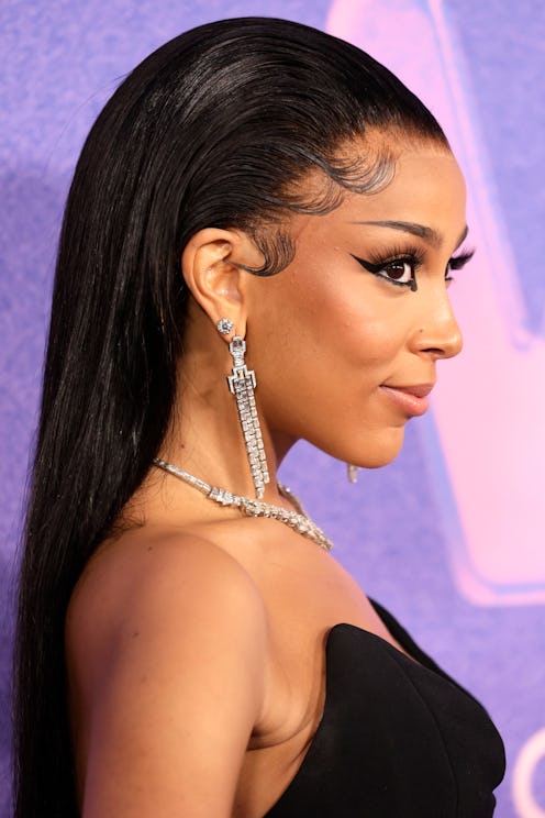 To honor (and mourn) Taco Bell Mexican pizza, Doja Cat shared a new song. Photo via Getty Images