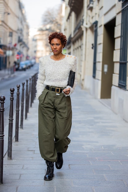 PARIS, FRANCE - MARCH 06: Sherita Starks Watkins seen wearing Balmain sweater, olive green Etro pant...