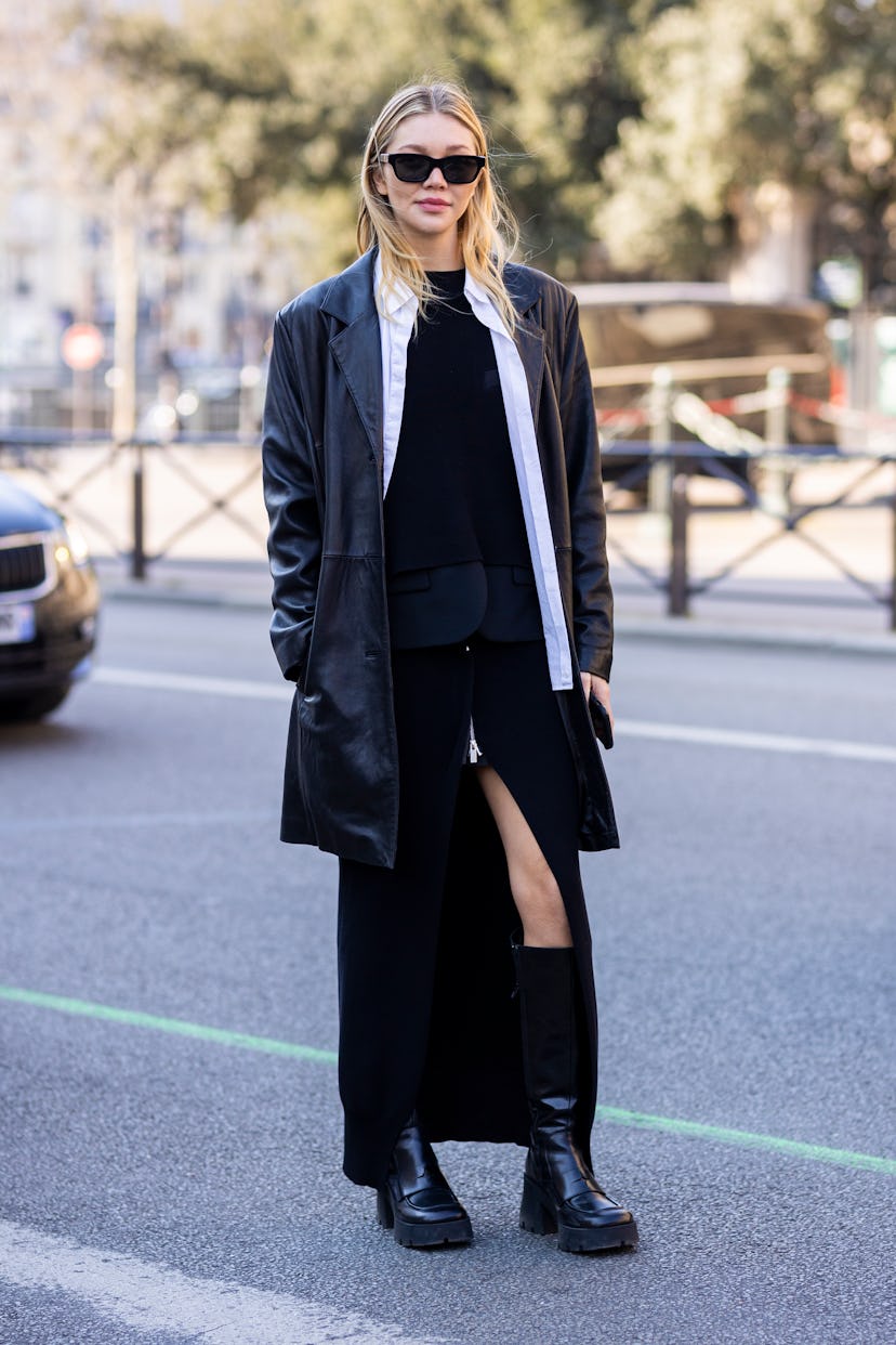 PARIS, FRANCE - MARCH 07: Jessie Andrews wearing a black leather jacket, white shirt, black long dre...