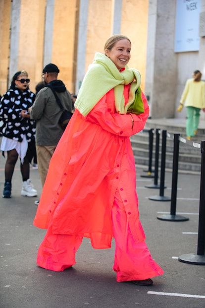 PARIS, FRANCE - MARCH 06: Chloe King of Amazon Fashion wears a hot pink neon dress and matching flar...
