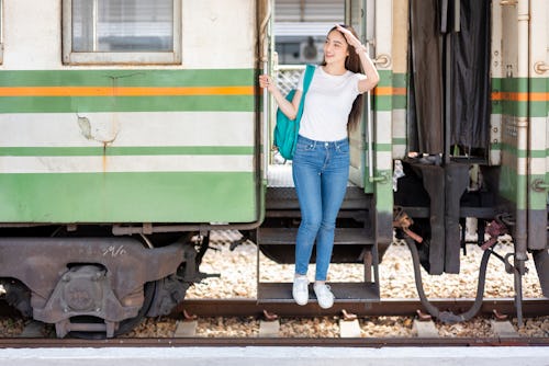 A woman gets off a train. If you're a Life Path Number 5, that means you enjoy thrill-seeking and ad...