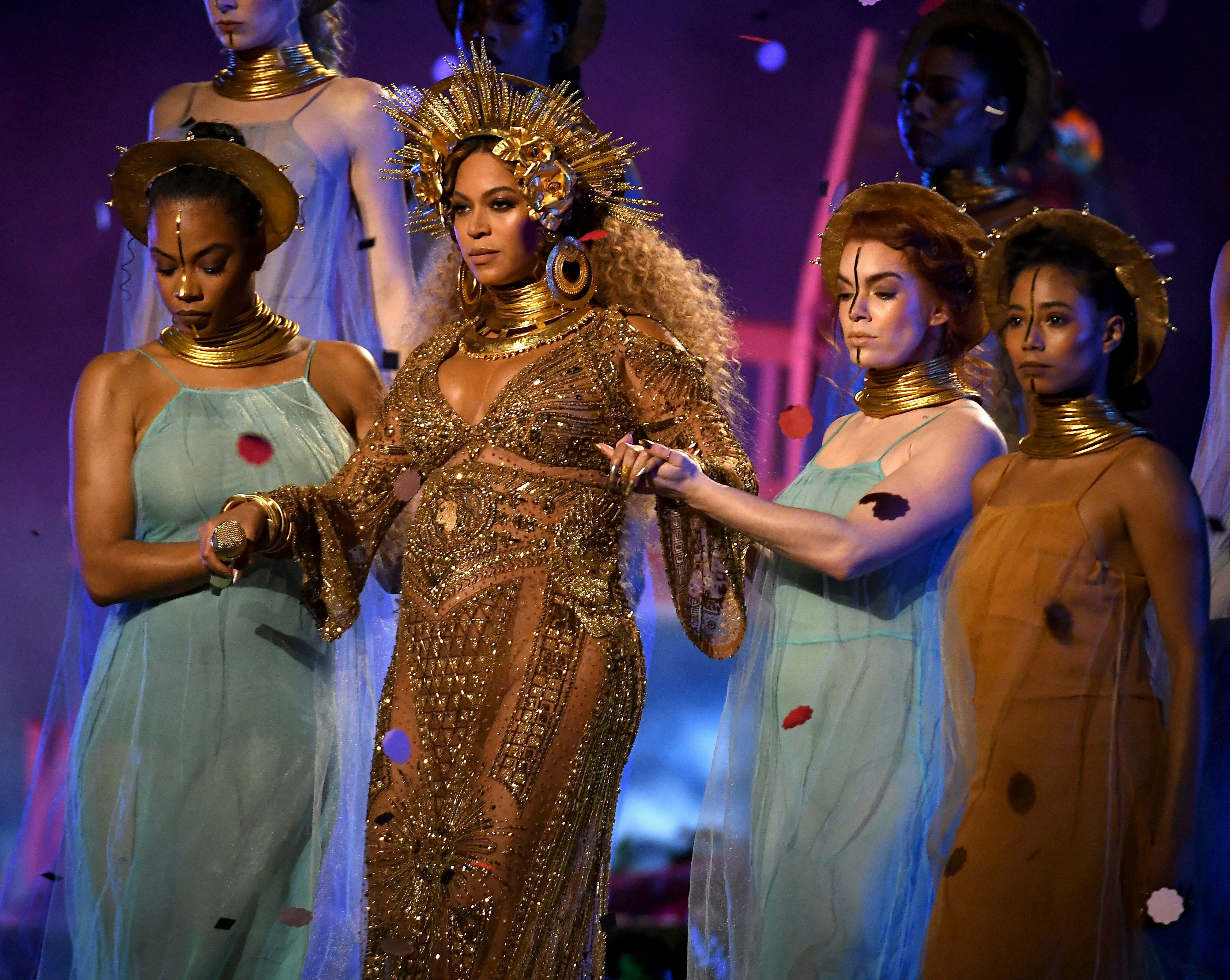 LOS ANGELES, CA - FEBRUARY 12: Beyonce performs onstage during The 59th GRAMMY Awards at STAPLES Cen...