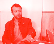 An Afghan man has his fingerprints taken to receive his e-ID card in Kandahar city, Afghanistan, Jan...