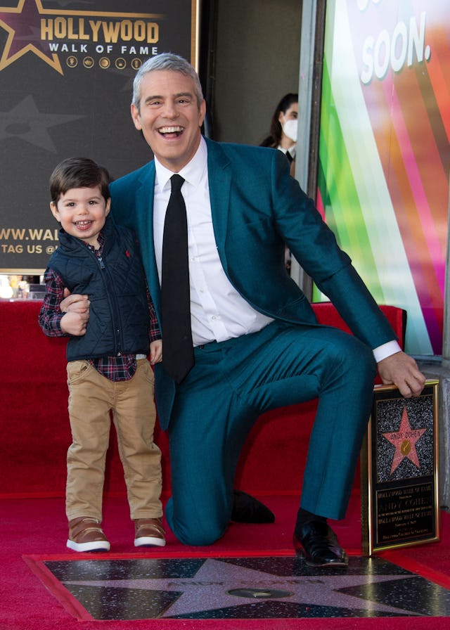 Talk Show host Andy Cohen poses with his son Benjamin during the ceremony to honor him with a Hollyw...