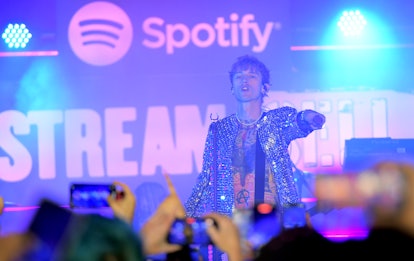 Machine Gun Kelly performs onstage as Spotify celebrates his "mainstream sellout" album release.