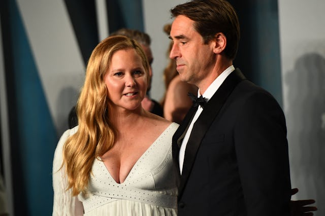 (L-R) Amy Schumer and Chris Fischer attend the 2022 Vanity Fair Oscar Party following the 94th Osca...