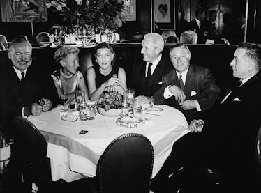 L-R: American author Ernest Hemingway (1899-1961), his wife, Mary Welsh, Leland Hayward's wife Nancy...