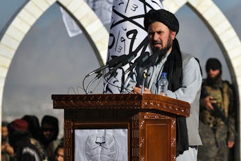 The commander of the Taliban army Qari Fasihuddin speaks during a flag hoisting ceremony of the Tali...