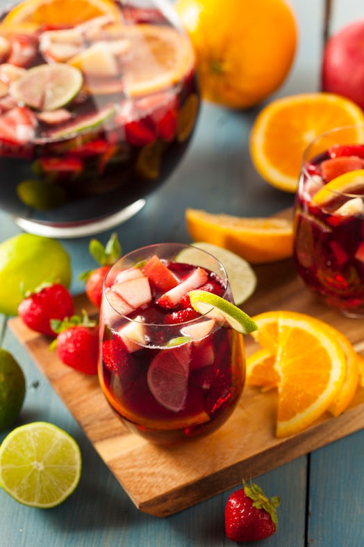 Homemade Delicious Red Sangria with Limes Oranges and Apples