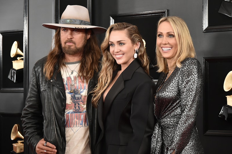 LOS ANGELES, CALIFORNIA - FEBRUARY 10: (L-R) Billy Ray Cyrus, Miley Cyrus and Tish Cyrus attend the ...