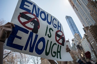 Protesters in a March For Our Lives rally demand stricter gun regulations in the aftermath of severa...