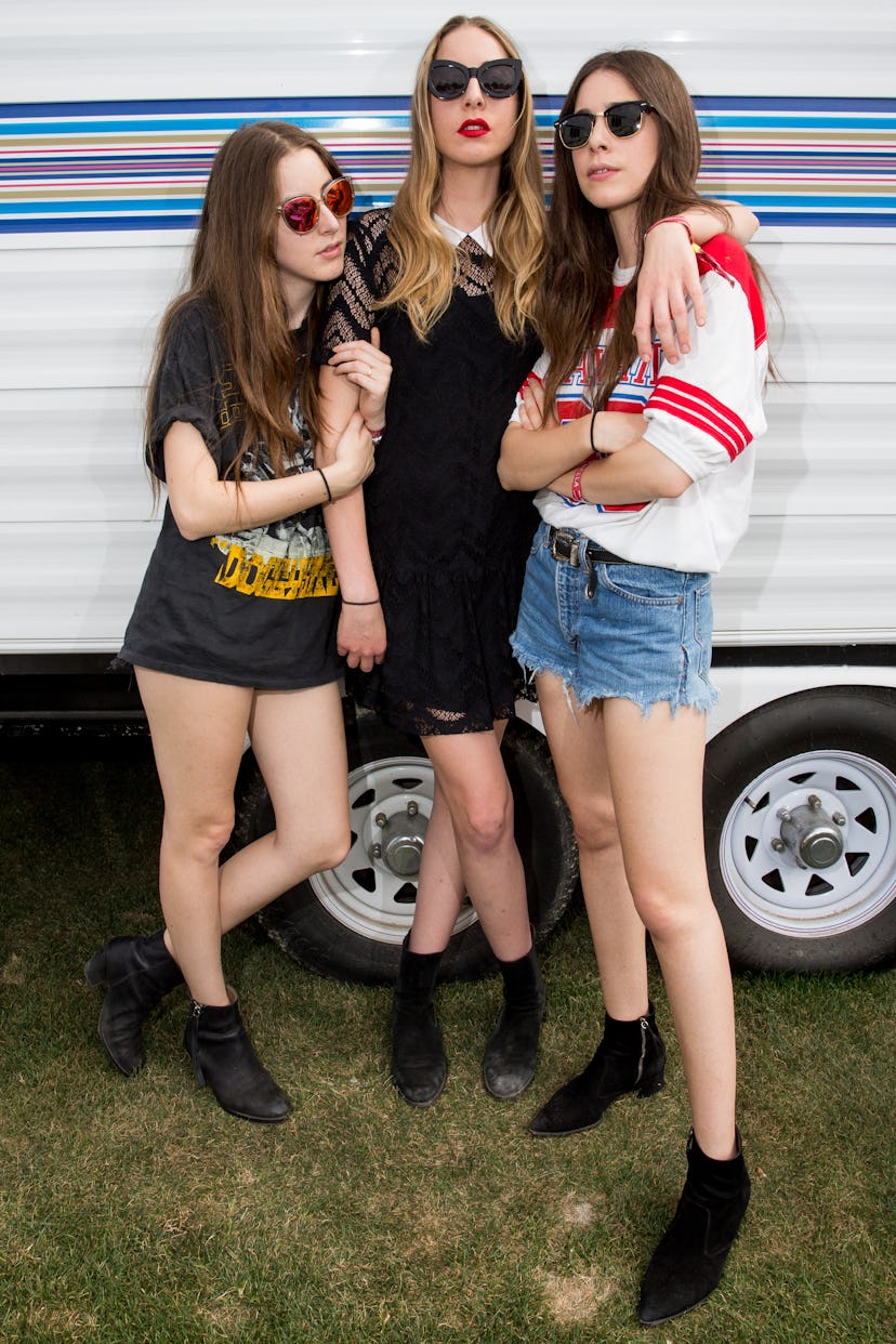 INDIO, CA - APRIL 18:  (L-R) Musicians Alana Haim, Este Haim and Danielle Haim of HAIM pose backstag...