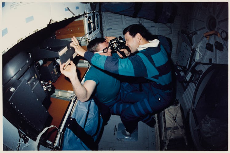 Astronauts Robert D Cabana (right), STS-41 pilot, and Bruce E Melnick, mission specialist, participa...